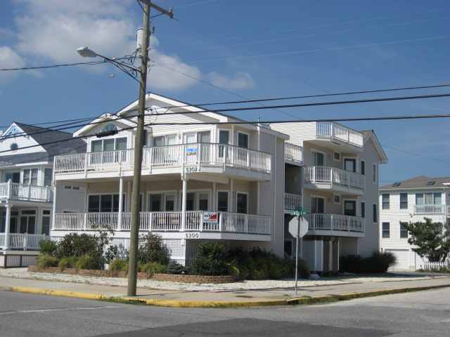 Extra Large 4 bed, 2 bath, corner with sweeping ocean views located right across from the beautiful southend. Outside shower, seperate enclosed storageroom & garage, great decks with Ocean Views including an exlusive large rooftop deck, spacious master bedroom, vaulted ceilings, tastefully furnished &decorated. A good value in the deep Southend. CALL 1-888-602-3243 for appointment